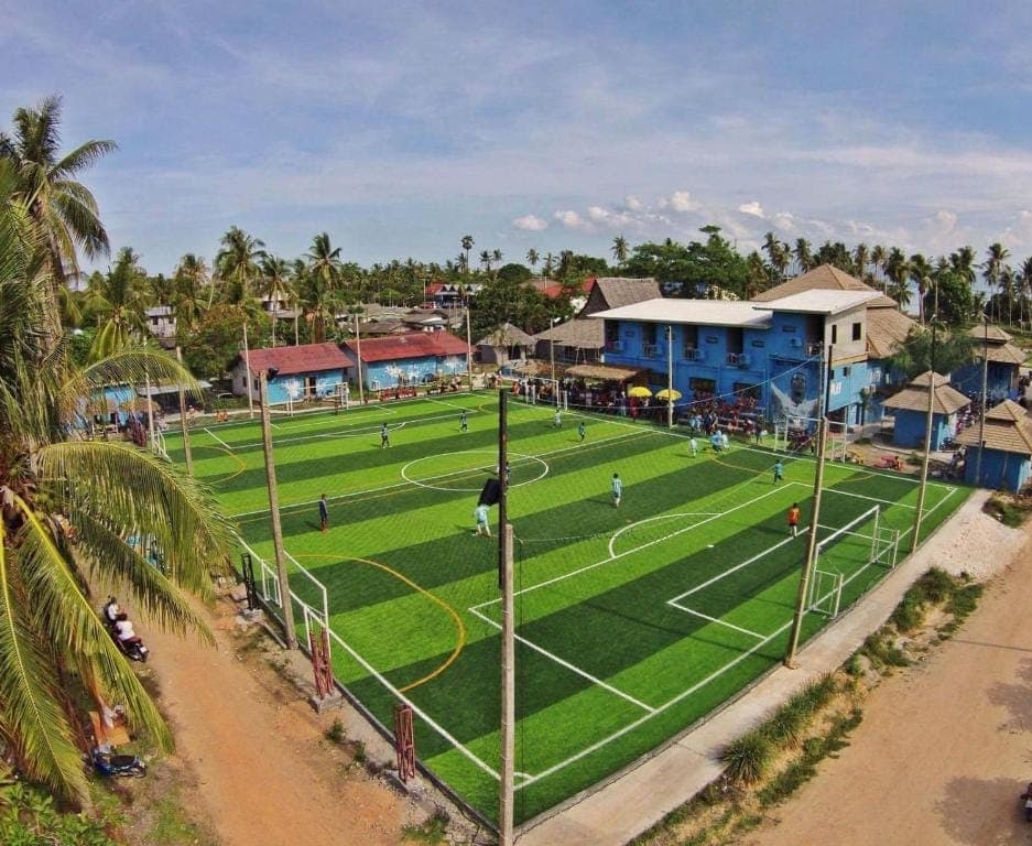The Arena Club football pitch under floodlights, Koh Phangan